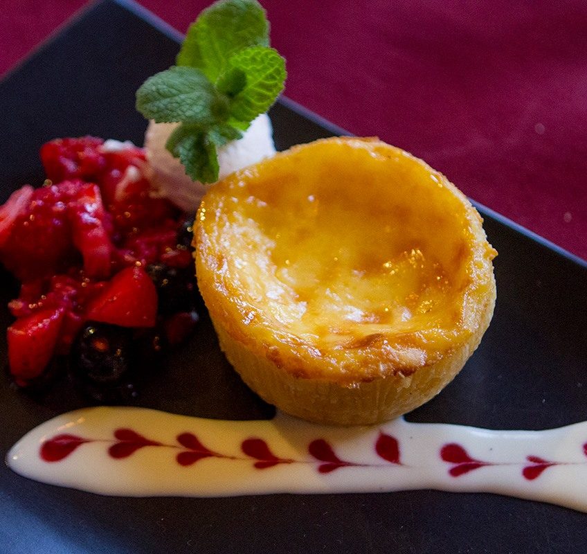 “Macanese” egg tart with berry compote