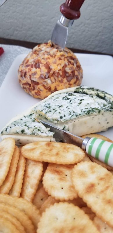Dill-encrusted Brie and nutty cheddar cheese