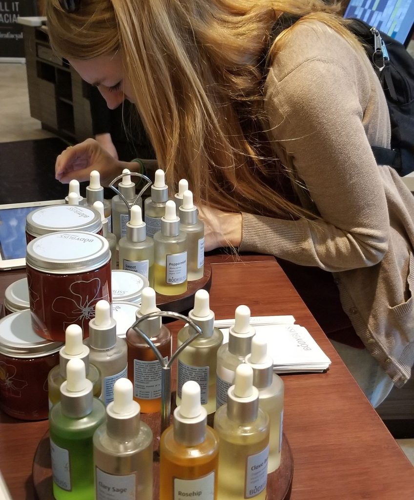 Mary Farah adds her oils to her butter base