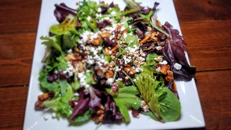 Organic Greens Salad with cranberries and candied nuts