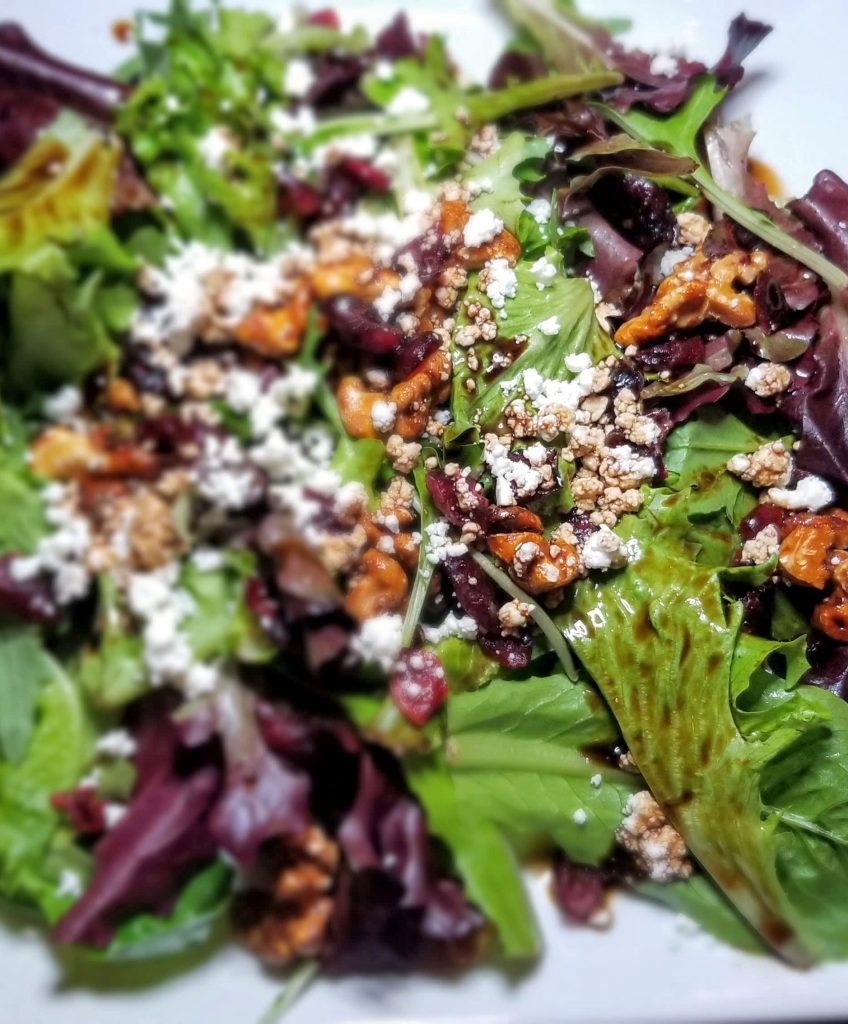 Organic Greens Salad with cranberries and candied nuts