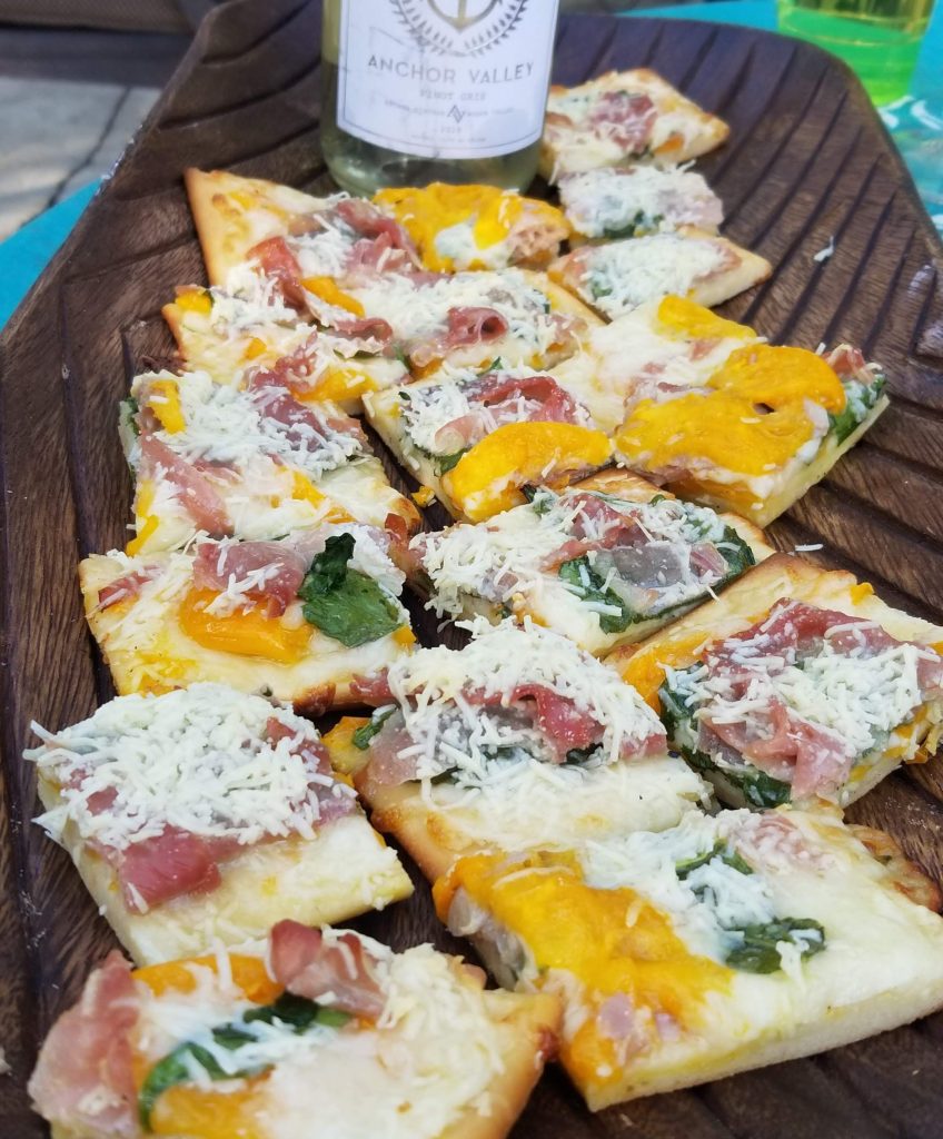 Prosciutto, Tomato and Spanish Spinach mini pizzas