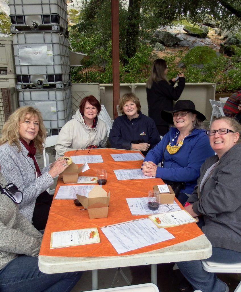 A group of ladies enjoy their wines and tarts at Milagro Winery
