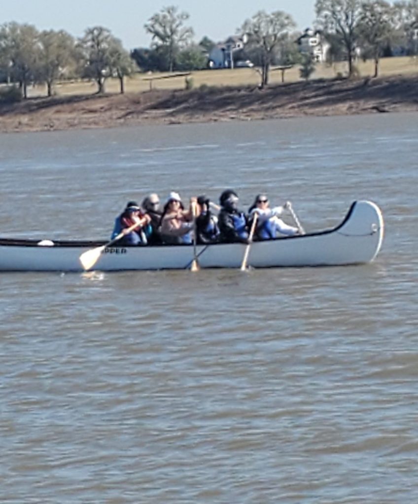 30-foot Voyageur canoes,